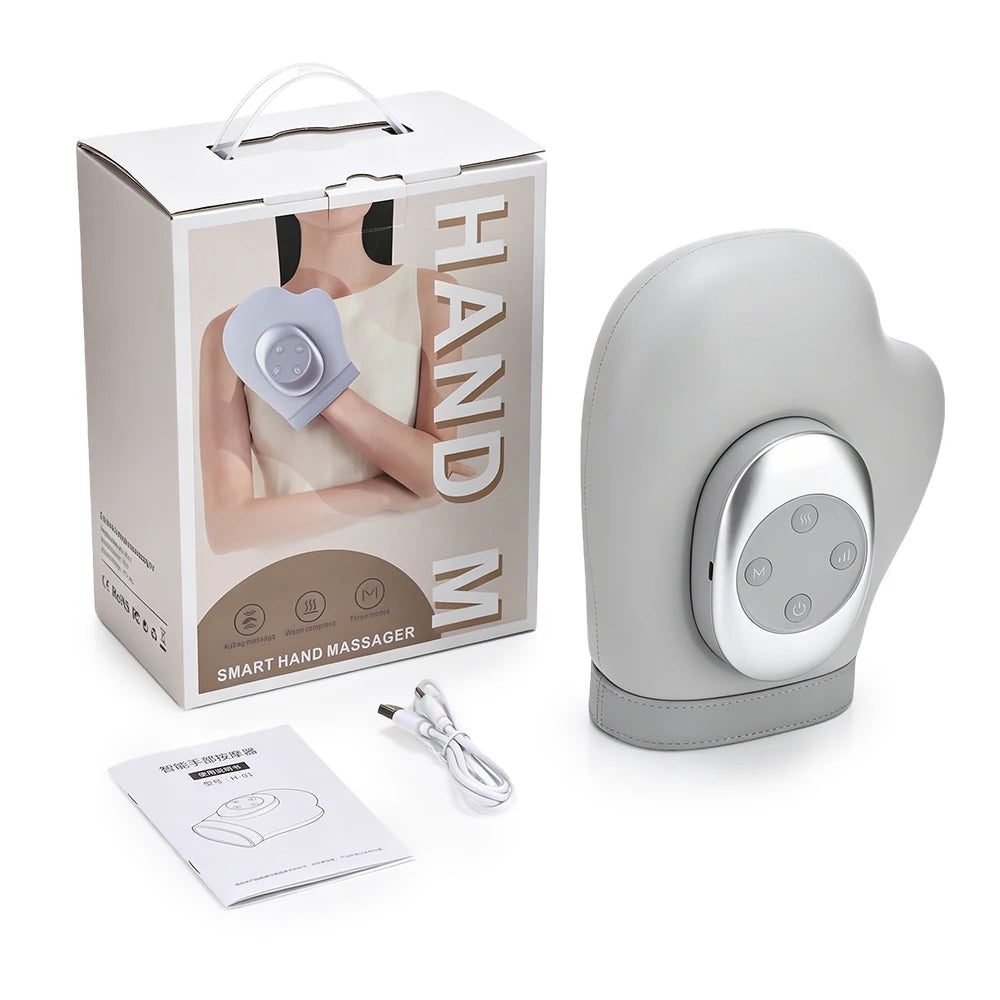 Person using shiatsu hand massager to relieve wrist and finger tension